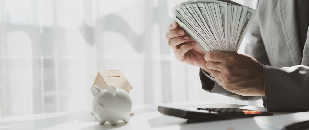 how do staffing agencies make money